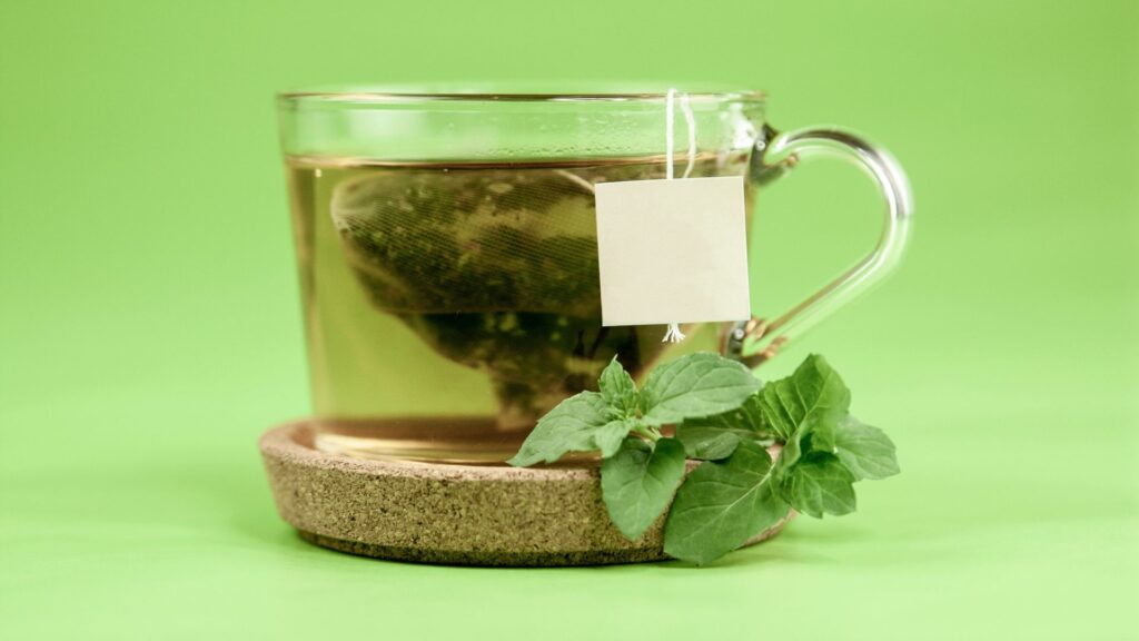 green tea in transparent mug